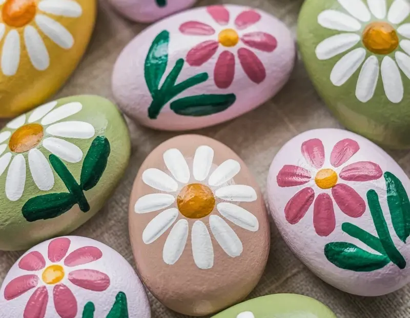 Hand-Painted Garden Stones with Floral Folk Art Designs | Painted Rock Craft Ideas