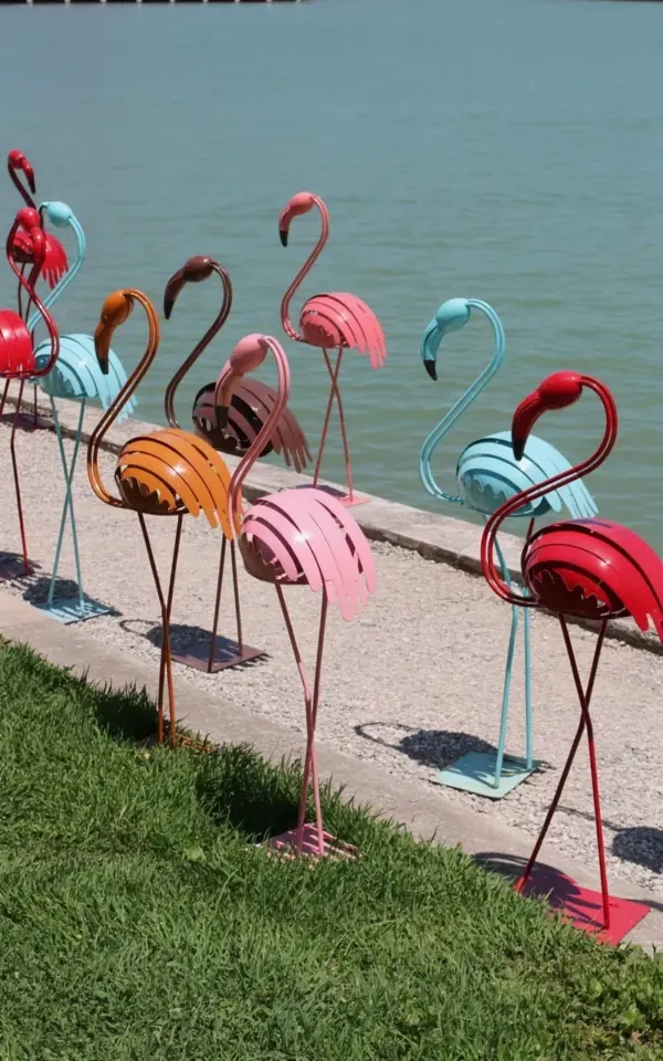 Garden Craft Idea: Colorful Metal Flamingo Sculptures by the Water